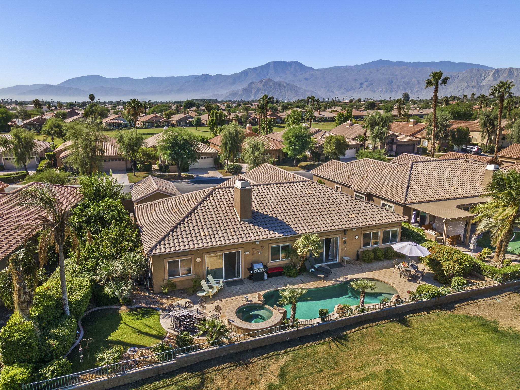 Aerial view of Indio property and mountain backdrop